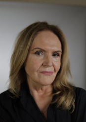 About Us. Catherine head shot